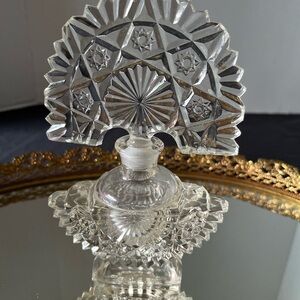 Elegant Crystal Perfume Bottle with Intricate Design